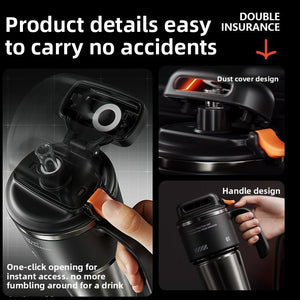 Black insulated travel mug with the flip lid open showing the drinking spout, dust cover and handle