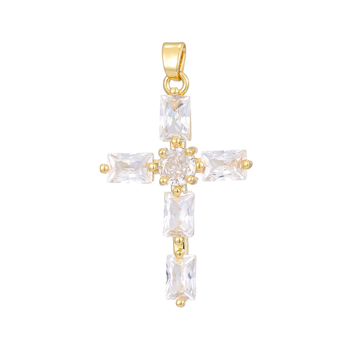 Cross pendant set with pink cubic zirconia hanging from a slim gold tone chain