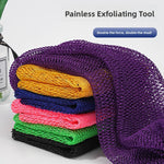 Stack of exfoliating mesh bath scrubber strips in several colors