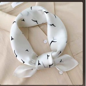White bird print printed square scarf with a soft satin sheen and a framed border, shown displayed
