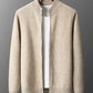 Camel wool knit zip cardigan on a wooden hanger, open front over a white tee, ribbed collar and hem