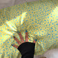 Yellow leopard silk pillowcase with blue spots on a yellow ground
