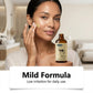 Model pressing a drop of WoodSleep tallow face essence onto her cheek, mild formula