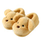 Soft plush slippers with a stitched puppy face and ears, artificial fur lining, shown in a home setting