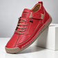 Casual shoe showing the elastic side panel and laces