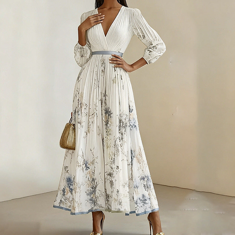 Floral print V neck pleated maxi dress full length front view on backdrop