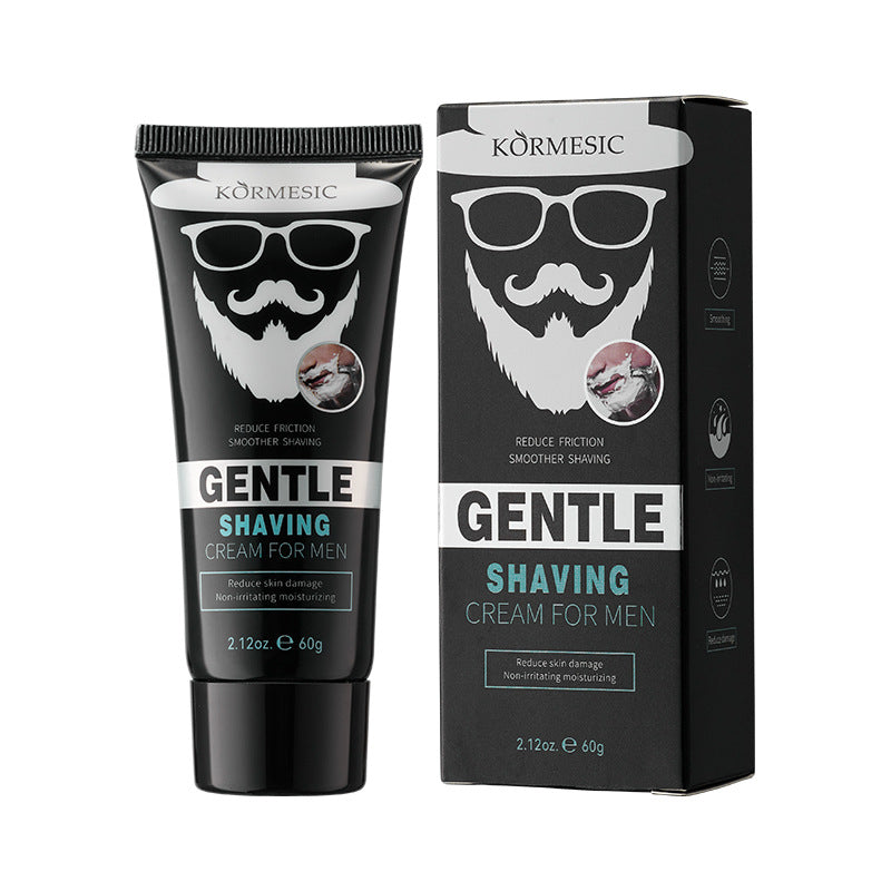 Black men's shaving cream tube next to its box with a bearded sunglasses mascot in white