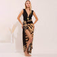 Floral one-piece swimsuit laid flat showing the deep V neckline top down