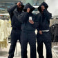 Boxy cropped grey white hoodie with dropped shoulder and ribbed cuffs from the front