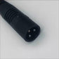 Black lithium charger brick shown from an angle on a plain white background