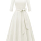 Vintage swing dress side profile showing fitted bodice and full A-line pleated skirt