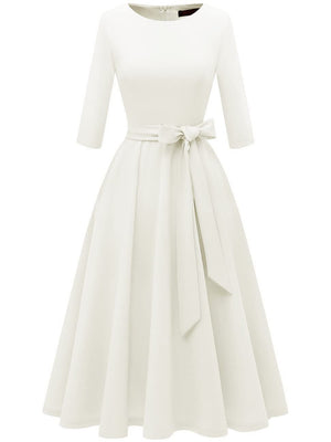 Vintage swing dress side profile showing fitted bodice and full A-line pleated skirt