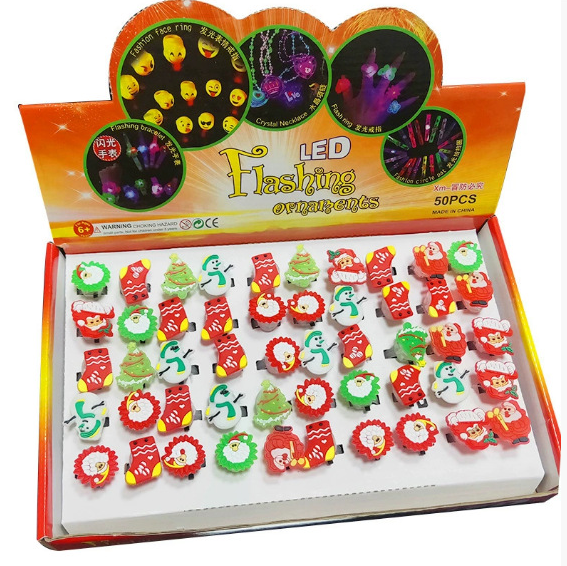 Single random Christmas LED light up finger ring with a glowing holiday design