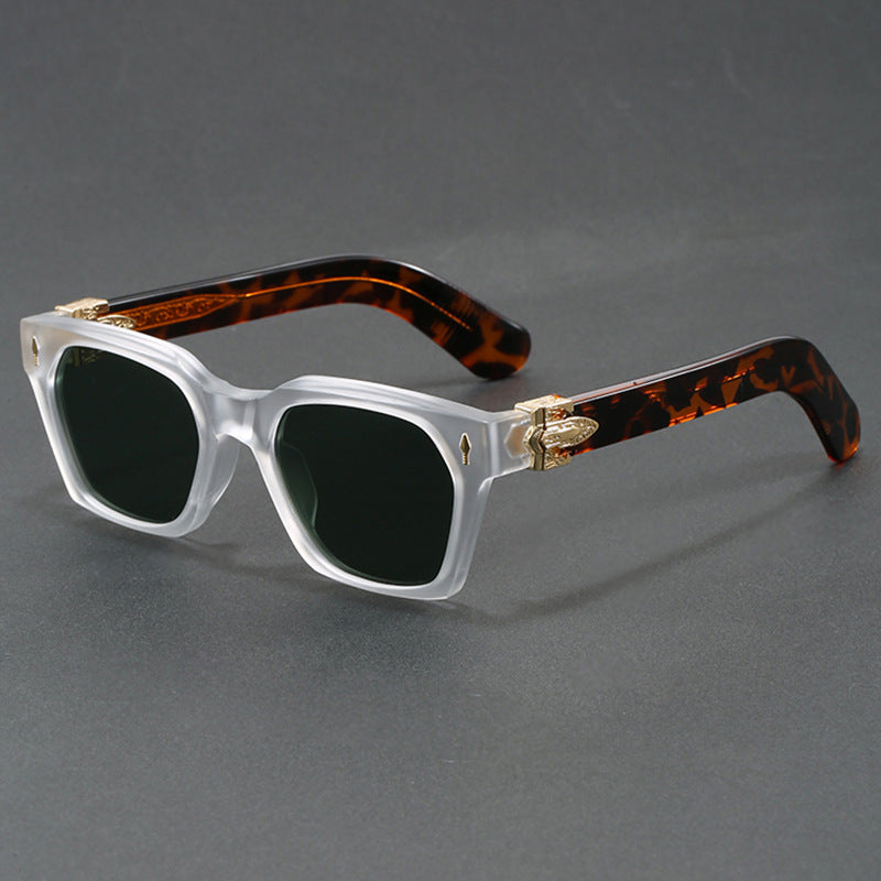 Square sunglasses with a blue to yellow gradient lens and gold temple arrowhead, side view