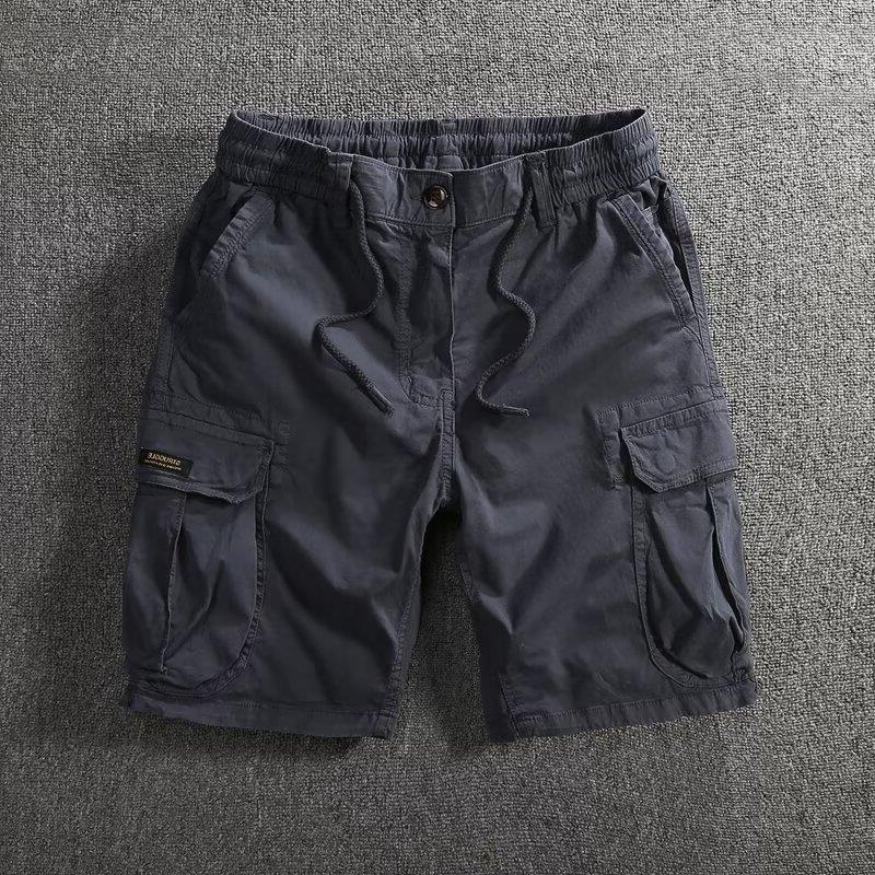 Men's cargo shorts shown flat with a part elasticated drawstring waist and a button fly