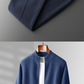 Blue knit zip cardigan on a hanger with navy jogger trousers folded above, size XXXL option