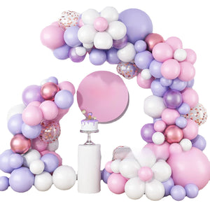 Pastel latex balloons and daisy foil shapes arranged for a party garland