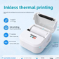 White mini thermal printer feeding a printed paper strip on a light desk surface