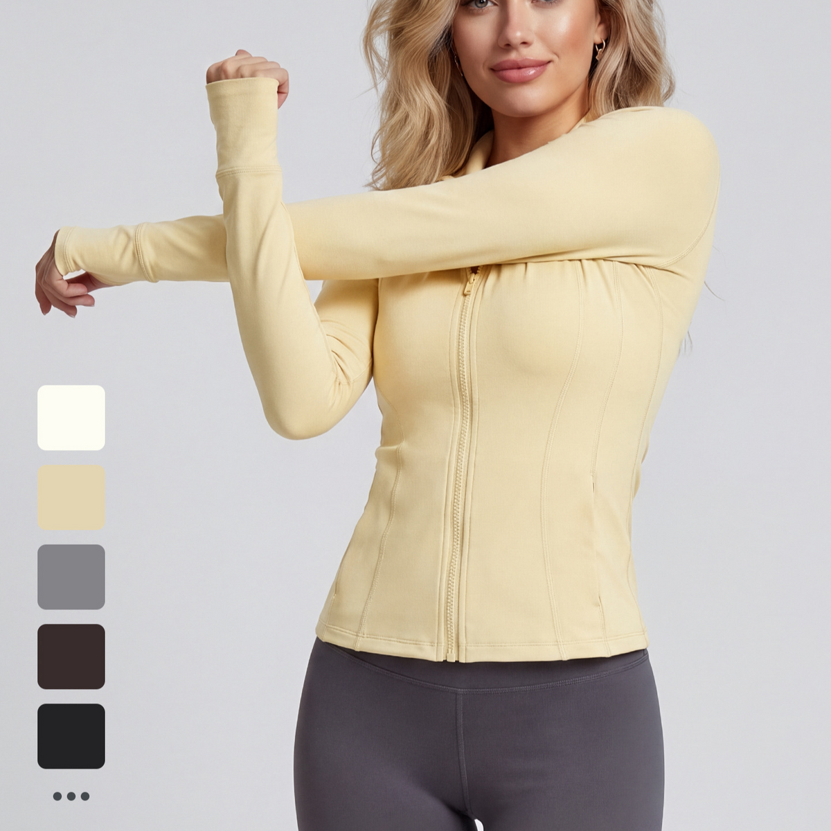 Woman stretching one arm across her chest in a yellow zip jacket, with five colour swatches on the left