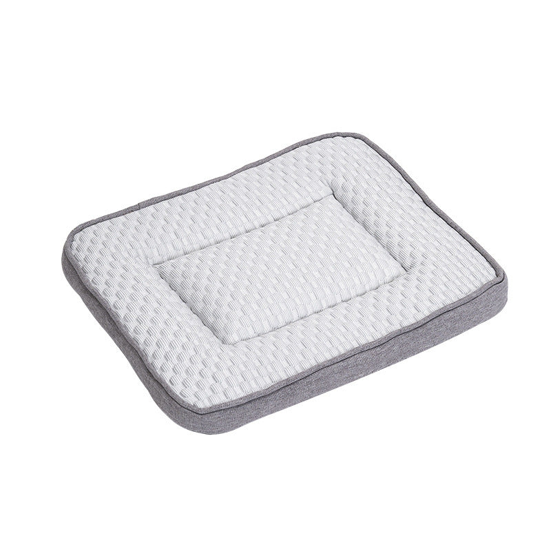Hand pressing the padded pet cooling mat to show the soft quilted fabric and scale
