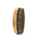 Lotus wood beard comb showing the wide tooth and fine tooth edges