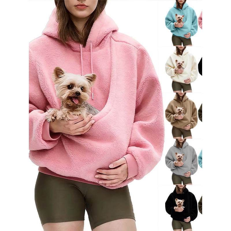 Woman in a pink plush hooded sweatshirt holding a small dog in the front pouch, with color thumbnails