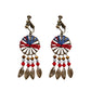 Vintage boho tassel clip-on earrings for non pierced ears, zinc alloy drop pair photographed on white background