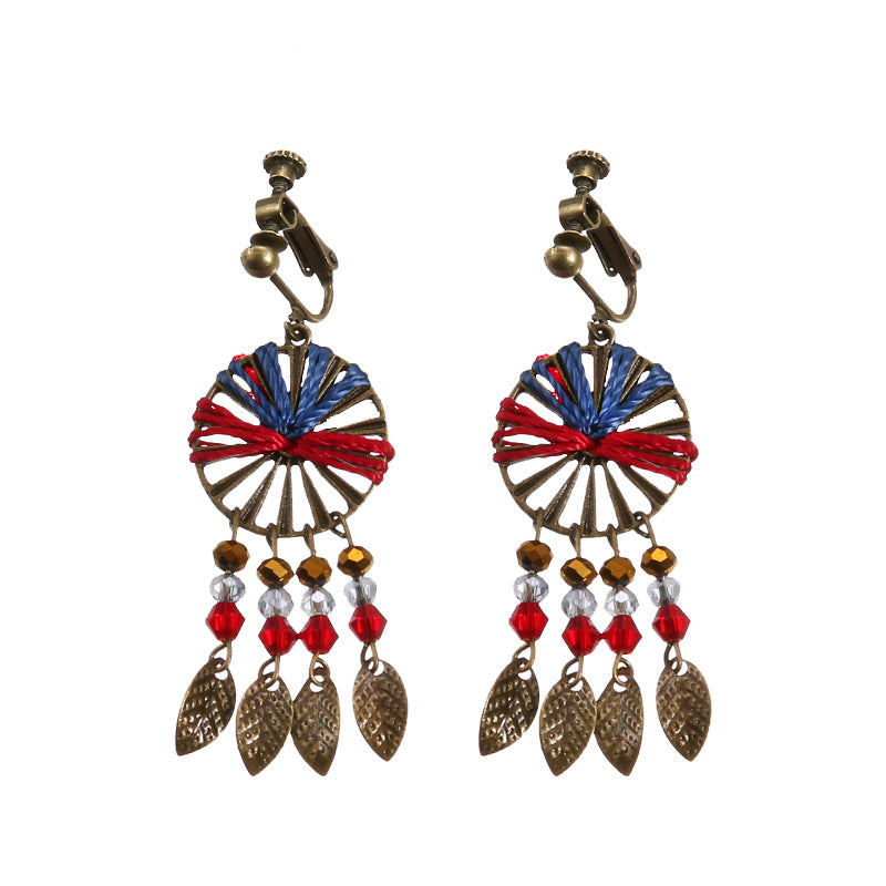 Vintage boho tassel clip-on earrings for non pierced ears, zinc alloy drop pair photographed on white background