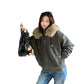 Gray green bomber jacket with vegan fur collar and silver zip on a white background with a black handbag