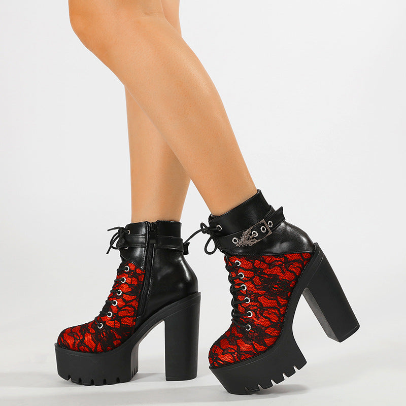 Close view of the floral lace overlay and silver eyelets on a platform ankle boot