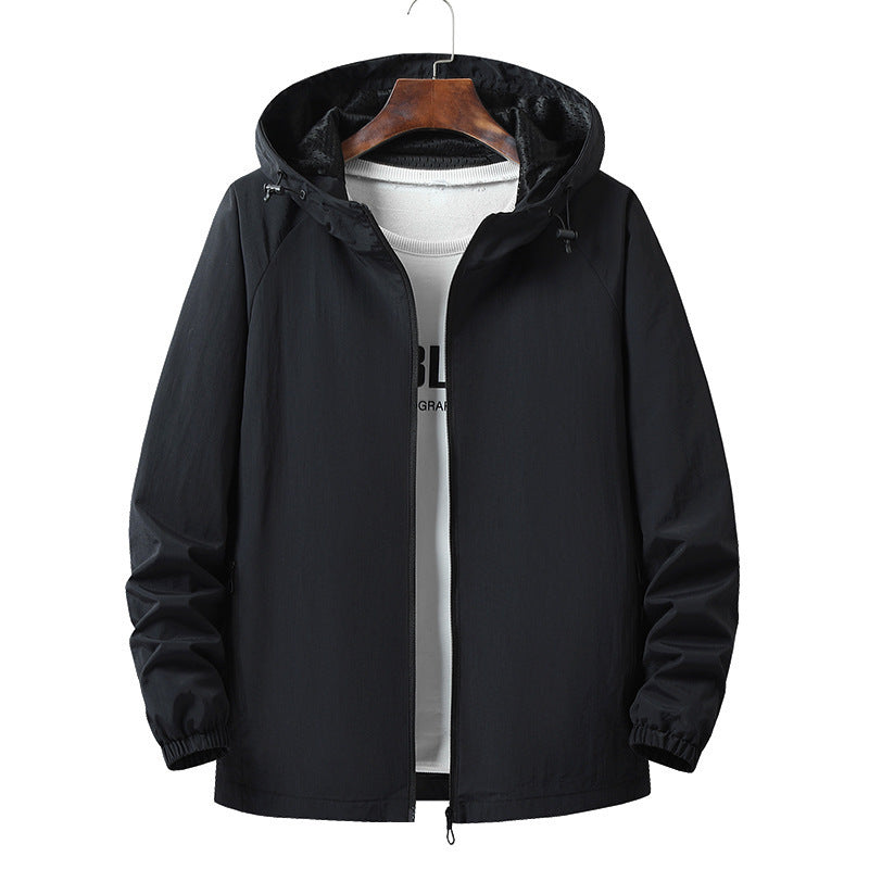 Zip side pocket detail on a lightweight mens nylon hooded jacket