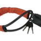 Braided steel cable steering wheel lock coiled with keys on a background