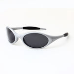 Wraparound sport sunglasses front view showing the silver frame and tinted lenses