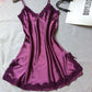 Dark purple satin slip nightdress with lace trim at the neckline and hem, flat on a gray cloth, option photo for size XL