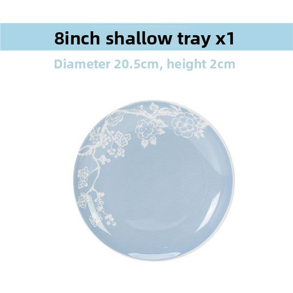 8 inch pale blue porcelain shallow plate with a white blossom print