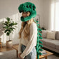 The ribbed spine tail of the dinosaur skeleton plush hood shown in detail