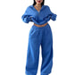 Blue cropped half-zip sweatshirt and wide-leg sweatpants set on a model, size M option