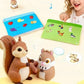 Child pointing at fruit and animal picture cards near two squirrel character readers