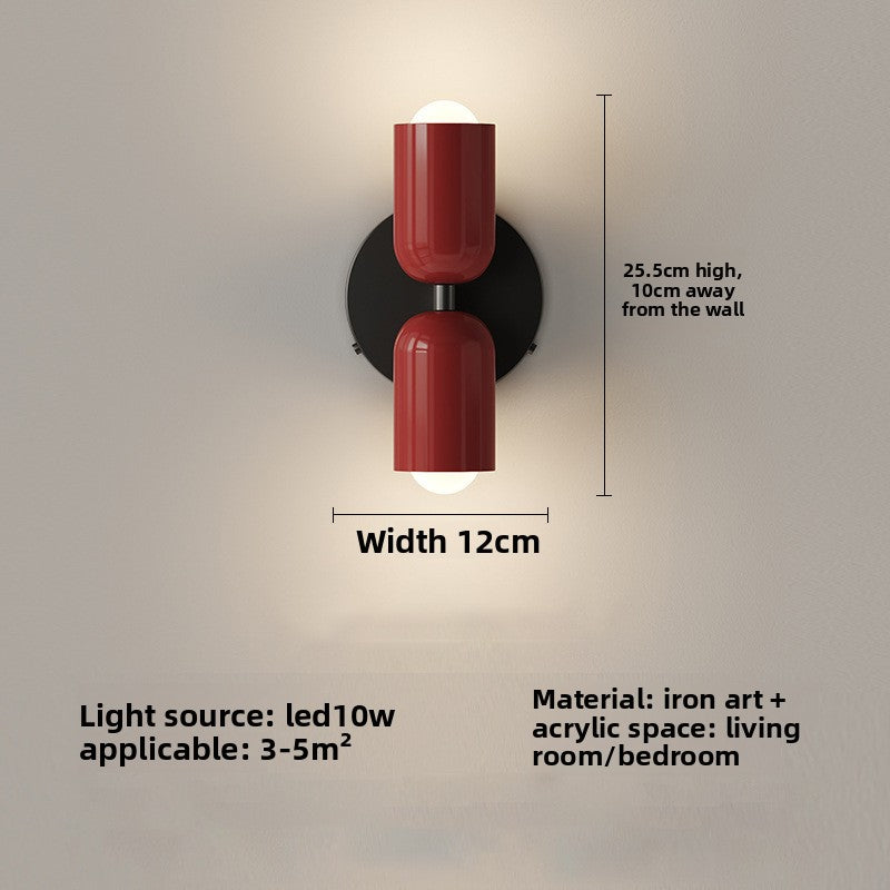 Bedside lamp shown in color finish options including red pink green and white