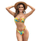 Strapless bandeau bikini styled in a neutral indoor setting