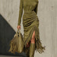 Olive green mock neck dress with ruched skirt and fringe slit, image of the size L option