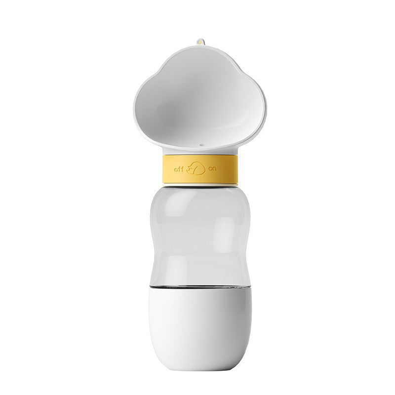 White portable pet water bottle standing with its cloud-shaped drinking trough folded open at the top