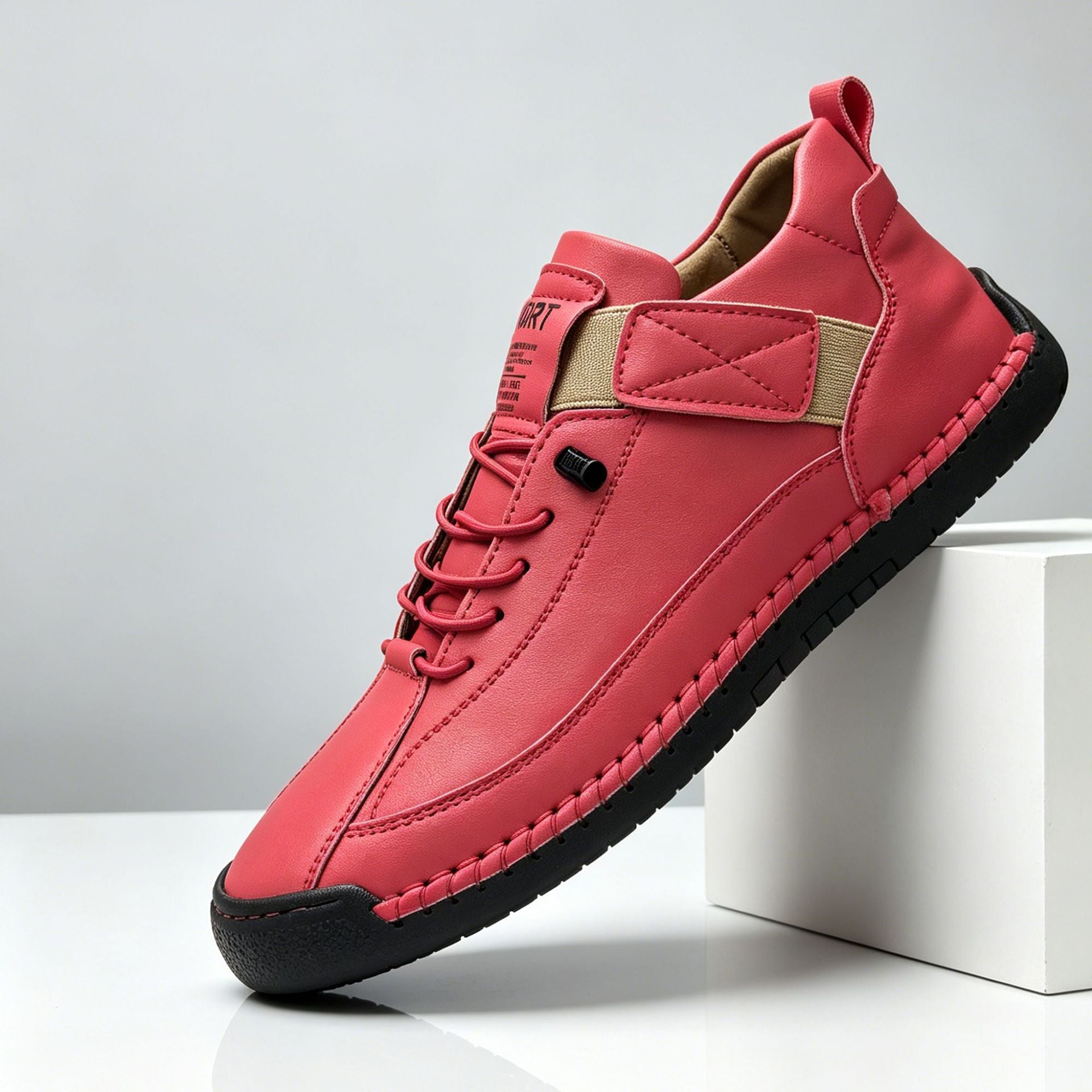 Hand-stitched casual shoes shown as a pair from above