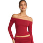 Woman in a Burgundy off the shoulder long sleeve cropped top on a white background