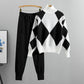 Black argyle knit sweater and jogger pants set with white panels on a hanger, size S option