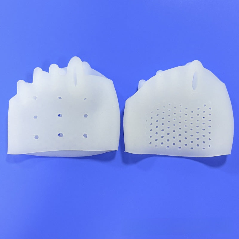 Close view of honeycomb perforations across the top of a forefoot cushion pad