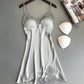 Ice silk lace cami nightgown in silver gray on a hanger with removable triangle bust pads beside it, full length view