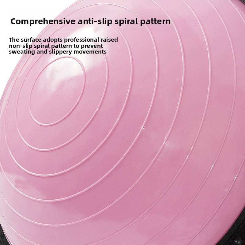 Pink inflatable balance dome top showing the concentric raised ring pattern up close