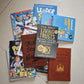 The Wolf Code book open beside other illustrated children's books
