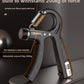 Grip strength trainer resistance dial marked in kilograms for adjusting tension